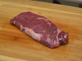 12 Top choice boneless NY strip steaks